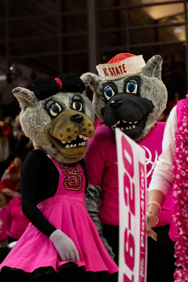 Mr. and Mrs. Wuf together during the halftime tribute to cancer survivors during the game versus Virginia Teach in Reynolds Coliseum on Monday, February 6, 2023. NC State lost to Virginia Tech 73-61.