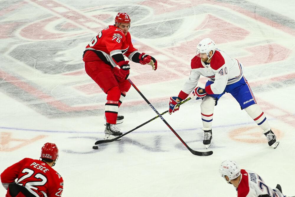 Carolina Hurricanes defenseman Brady Skjei defends opponent during the game against the Montreal Canadiens in PNC Arena on Thursday, Feb. 16, 2023. The Hurricanes won 6-2.