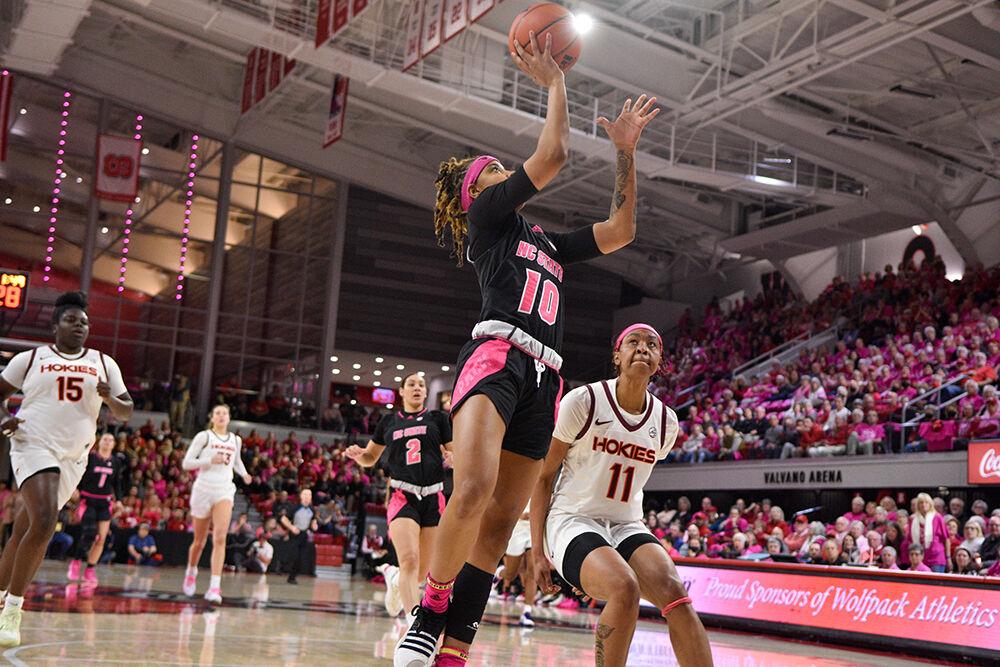 Sophomore guard Aziaha James jumps to shoot a basket during the game against Virginia Tech at William Neal Reynolds Coliseum on Mon. Feb. 6, 2023. The Play4Kay event was held during the game as a memorial to former head coach Kay Yow and a celebration for all who have suffered from breast cancer. Virginia Tech won 73-61.