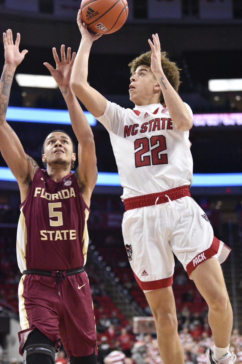 Freshman guard Jordan Snell shoots at the goal during the game against the Florida State Seminoles inside PNC Arena on Wednesday, Feb. 1, 2023. The Wolfpack won 94-66.