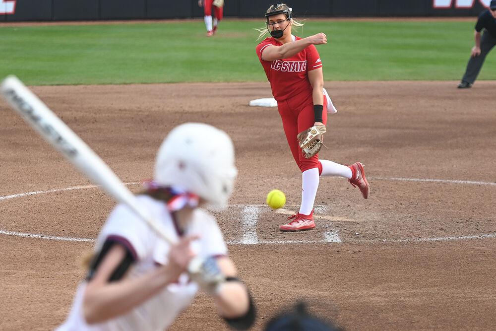 Freshman pitcher Wynne Gore pitches the ball during the game against the Penn Quakers at Dail Softball Stadium on Friday, Feb. 24, 2023. Gore had one run during the game. The Wolfpack beat the Quakers 15-6.
