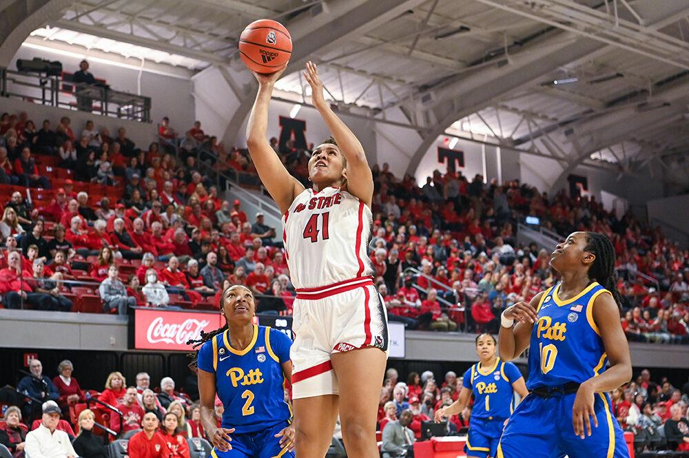 Senior center Camille Hobby makes a layup in the game against Pitt inside Reynolds Coliseum on Sunday, Feb. 26, 2023. Hobby led the team in points scored, scoring 21 points for the Wolfpack. NC State beat Pitt 68-63.