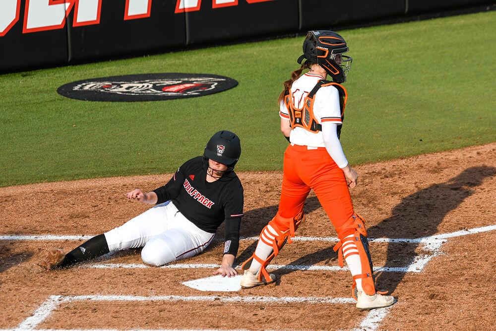 Freshman infielder Michele Tarpey slides to home plate during the game versus the Campbell Camels on Tuesday, March 22, 2022 in Dail Softball Stadium. Tarpey had one run against Campbell. The Wolfpack beat the Camels 2-0.