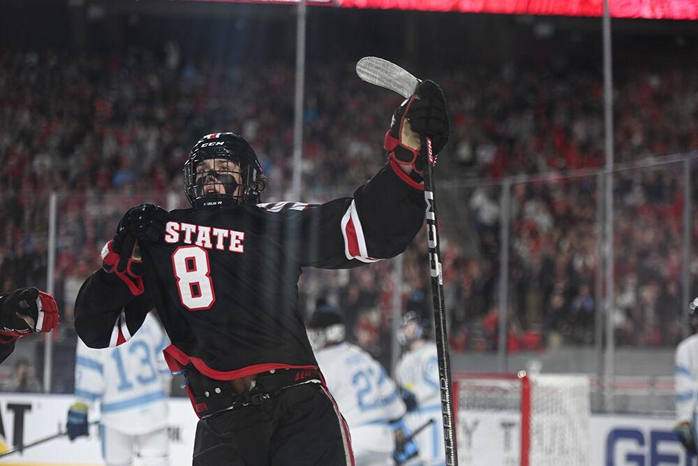 Freshman forward Zachary Herman celebrates his goal during the Icepack hockey team's Frozen Finley home game against the UNC-Chapel Hill Tar Heels in Carter-Finley Stadium on Monday, Feb. 20, 2023. The Wolfpack beat the Tar Heels 7-3 after the Carolina Hurricanes played a Stadium Series game in the same location two days prior.