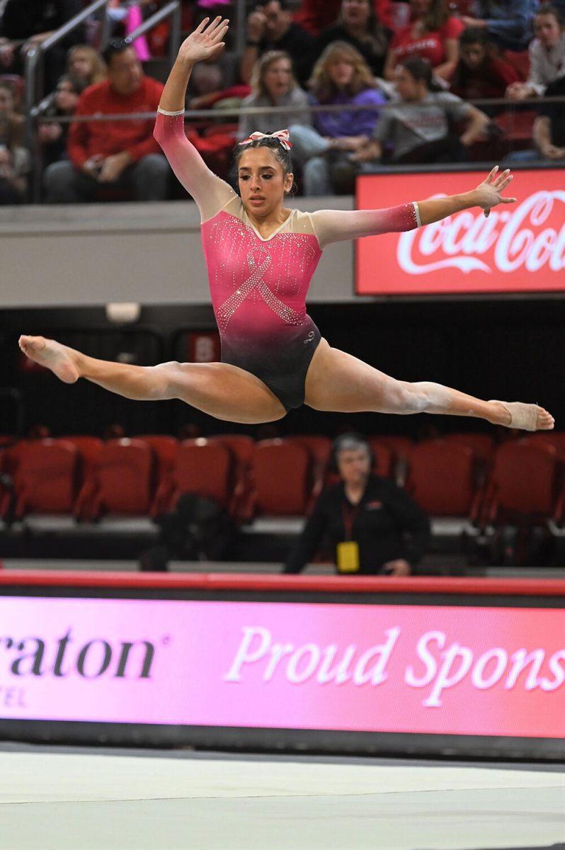Junior Gabrielle Diaz performs her floor routine during the meet against UNC-Chapel Hill and Western Michigan at Reynolds Coliseum on Saturday, Feb. 4, 2023. NC State won the meet with an overall score of 196.275.