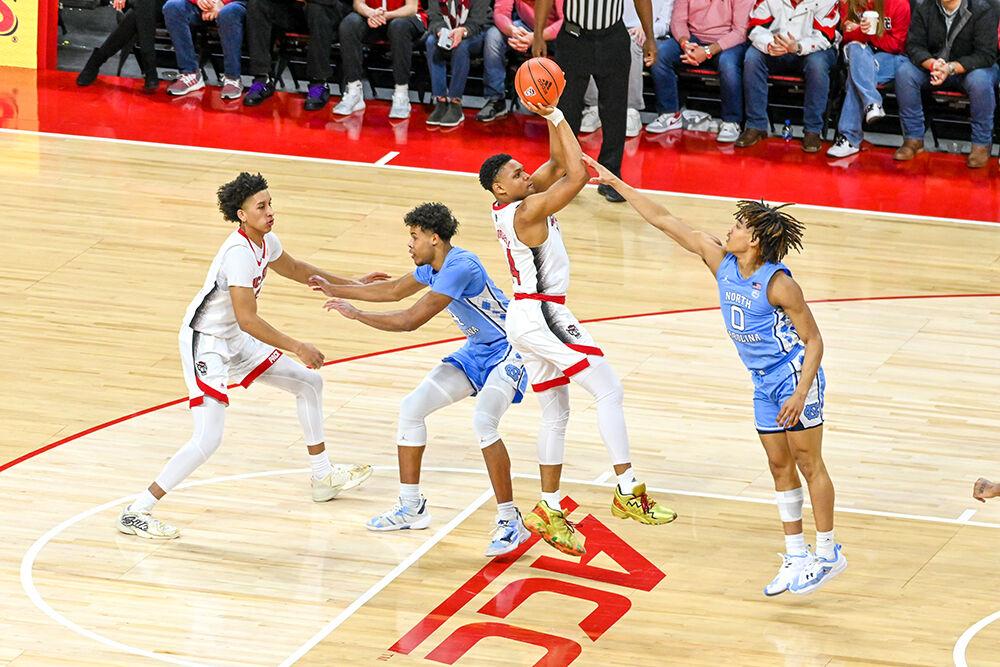 Senior guard Casey Morsell shoots the ball during the game against UNC-Chapel Hill in PNC Arena on Sunday, Feb. 19, 2023. Morsell had 12 points for NC State. The Wolfpack beat the Tar Heels 77-69.