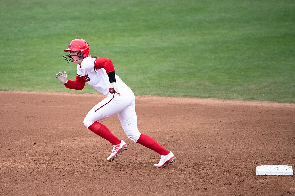 Freshman outfielder Ellie Goins runs off second base during the game versus Purdue at Dale Softball Stadium on Sunday Feb. 19, 2023. Goins had one hit in the game. NC State beat Purdue 4-3.