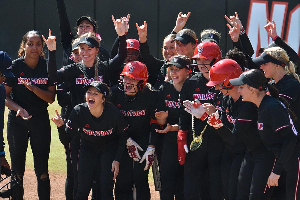 The NC State softball team celebrates a home run during the game against Boston College at Dail Softball Stadium on Saturday, March 18, 2023. NC State won 8-4.