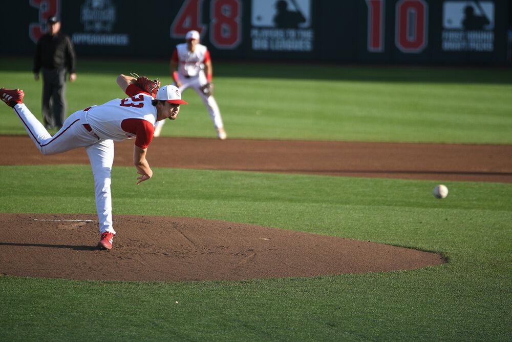 Junior pitcher Matt Willadsen pitches during the Wolfpack's home game against the Louisville Cardinals on Doak Field at Dail Park on Saturday, April, 1, 2023. Willadsen allowed zero runs in six innings pitched. The Wolfpack beat the Cardinals 10-0, guaranteeing the series win.