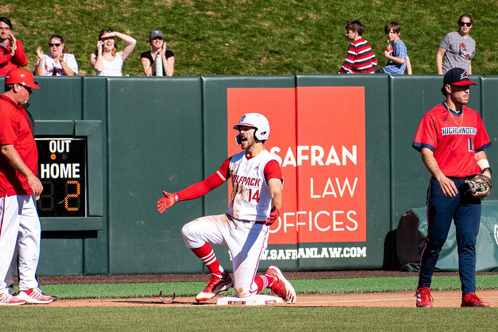Sophomore center Jacob Cozart celebrates after making it to third base during the game against NJIT at Doak Field at Dail Park on Sunday, March 5, 2023. The Wolfpack beat the Highlanders 6-5 to sweep the series.