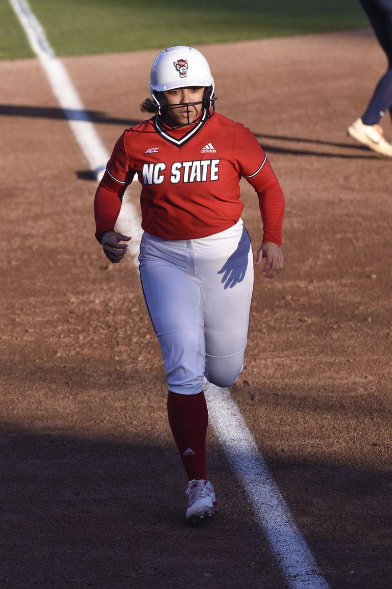 Freshman infielder Nadia Sykes runs to home plate during the game against North Carolina A&amp;T at Dail Softball Stadium on Wednesday, March 29, 2023. NC State won 8-2.
