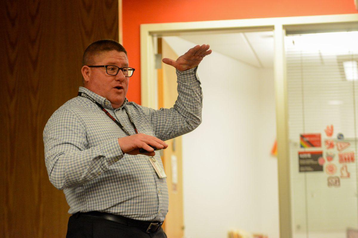 Chief of Police Dan House explains and demonstrates in detail about training with other precincts and departments for the Chats With Chief event hosted by Student Government in Talley Student Union on Thursday, Feb. 23 2023. Dan mentioned how Campus Police will have the opportunity over the summer to train in a variety of areas with Raleigh Police to foster a relationship between both departments.