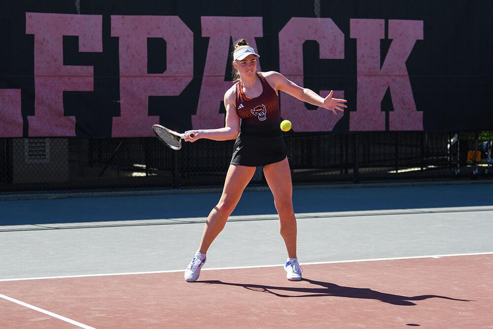 Junior Amelia Rajecki prepares a forehand swing in her singles match against Clemson at the Dail Outdoor Tennis Stadium on Sunday, March 5, 2023. Rajecki won her singles match with scores of 6-0 and 6-2. NC State won the overall match 6-1.