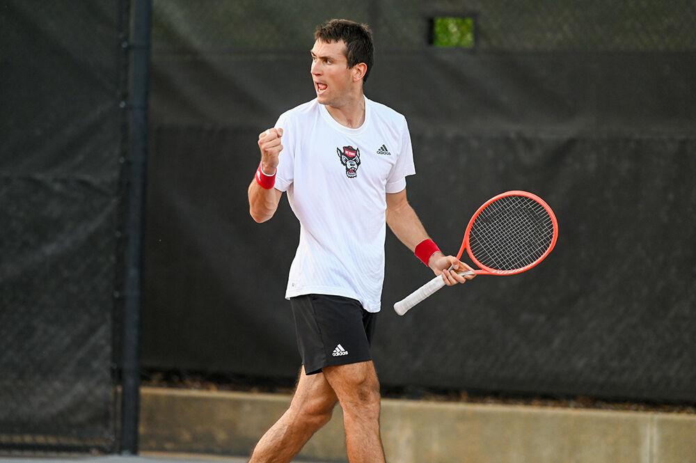 Junior Luca Staeheli celebrates during the match against Notre Dame at Dail Outdoor Tennis Stadium on Friday, March 24, 2023. Staeheli won his singles match and NC State beat Notre Dame 4-0.
