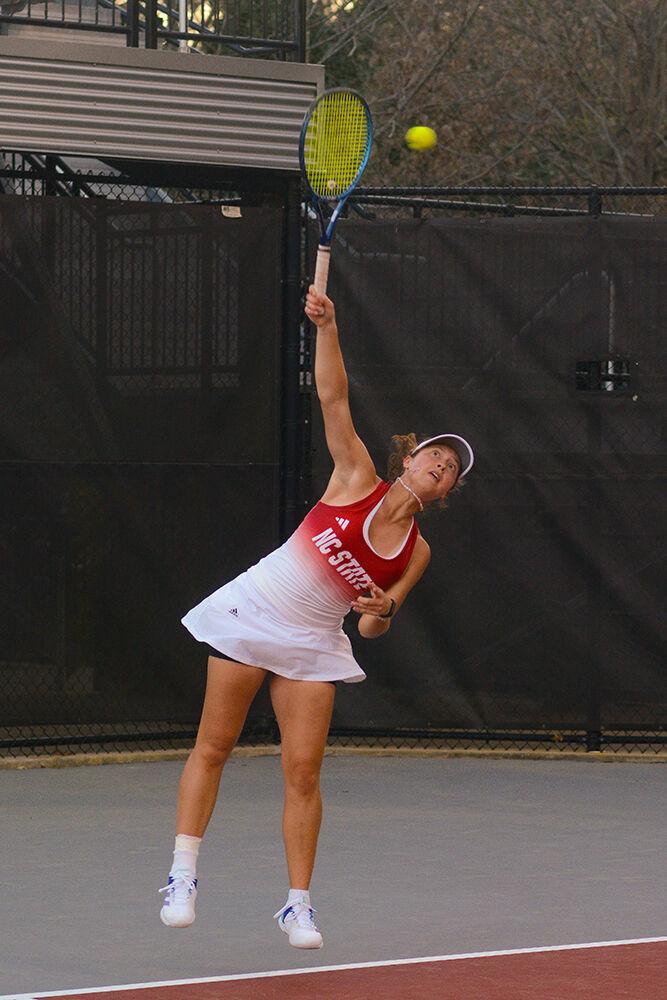 Freshman Anna Zyryanova lunges at the ball during her singles match against East Tennessee University State at the Dail Outdoor Tennis Stadium on Sunday, March 5, 2023. Zyryanova won her singles match 2-0. NC State beat ETSU 7-0.