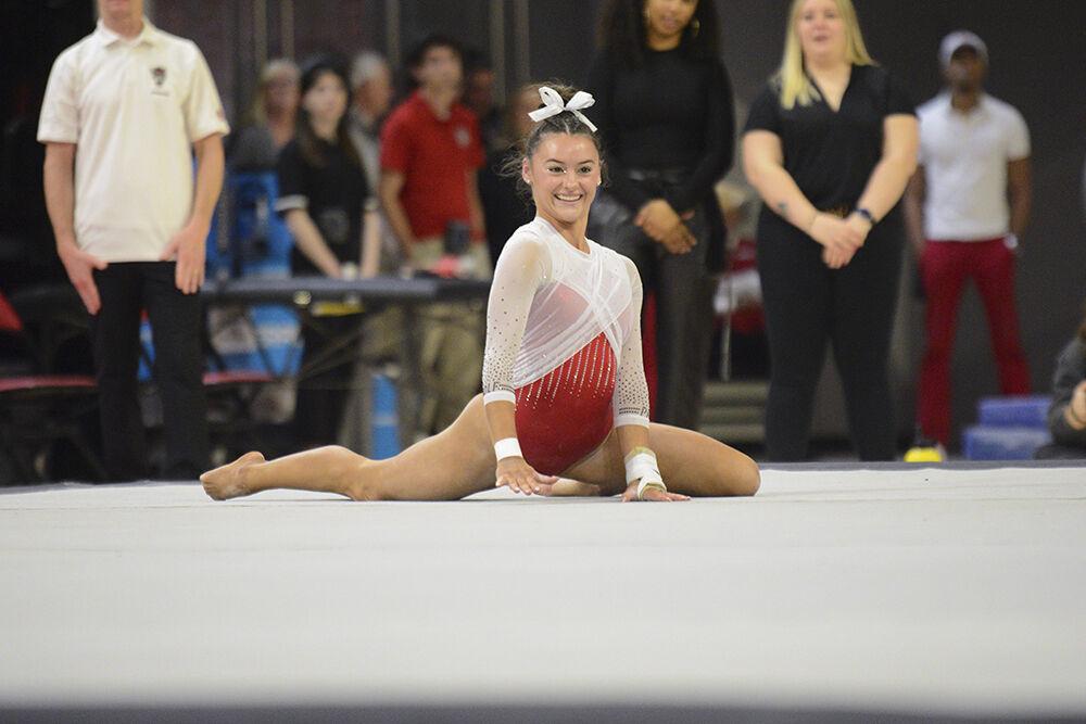 Senior Emily Shepard poses in her floor routine in the meet against Rutgers at Reynolds Coliseum on Saturday, March 4, 2023. Shepard scored a 9.950 for the event. NC State beat Rutgers 197.225-196.225.