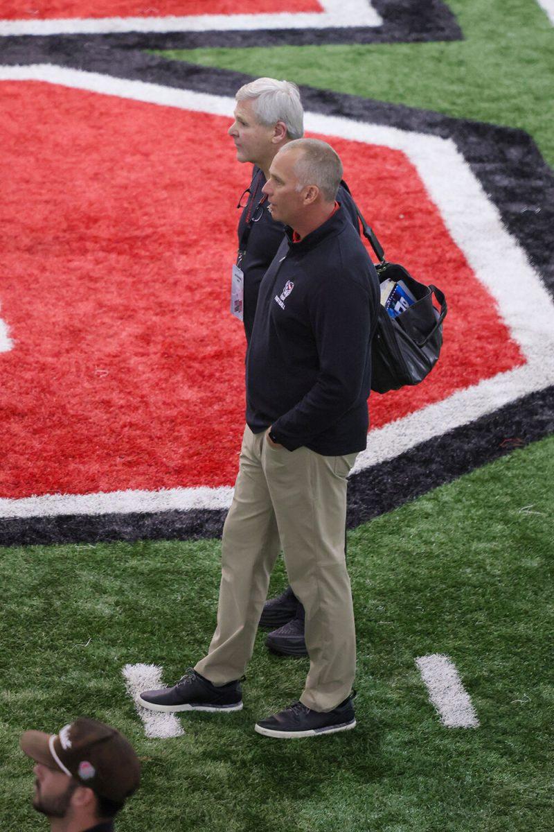 Head Coach Dave Doeren observes as players participate in drills during NC State's Pro Day at the Close-King Indoor Facility on Tuesday, March 28, 2023.
