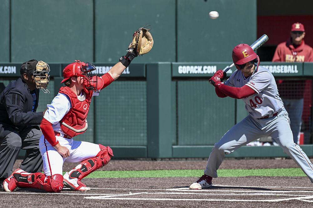 Freshman catcher Cannon Peebles catches the ball during the game against Elon at Doak Field at Dail Park on Tuesday, March 14, 2023. NC State lost to Elon 14-6.