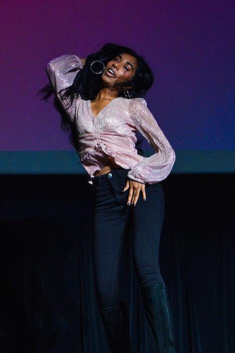 Iniya Gnanakkumaran, a fourth-year studying mechanical engineering, dances to a cover of "Sweet But Psycho" by Ava Max in Witherspoon Campus Cinema on Friday, March 31, 2023. The UAB Wolfpack's Got Talent event was held to showcase the various talents of students at NC State.