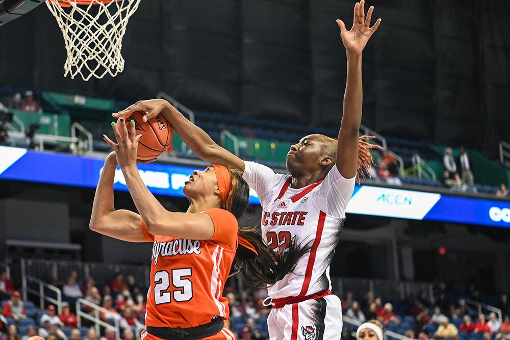 Sophomore guard Saniya Rivers blocks Syracuse senior guard Alaina Rice's shot during the second round of the ACC Tournament game in Greensboro Coliseum on Thursday, March 2, 2023. Rivers scored eight points, made five rebounds and five assists for the Wolfpack. NC State beat Syracuse 83-58.
