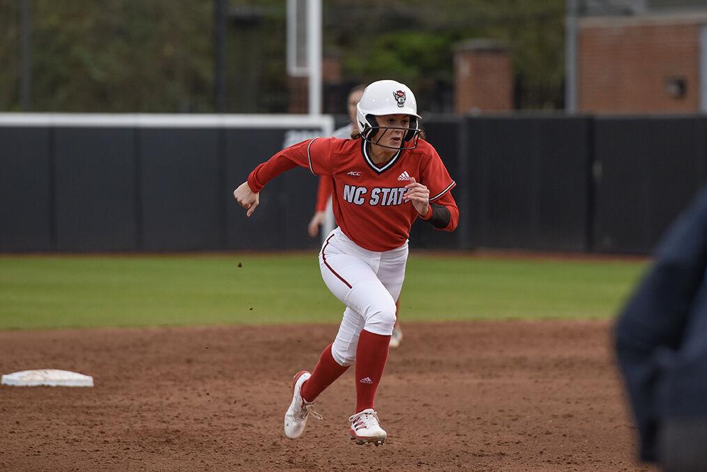 Freshman outfielder Gabi Wilson runs to third base during the game against the Radford Highlanders in Dail Softball Stadium on Wednesday, March 22, 2023. Wilson scored one run. The Wolfpack beat the Highlanders 8-7.