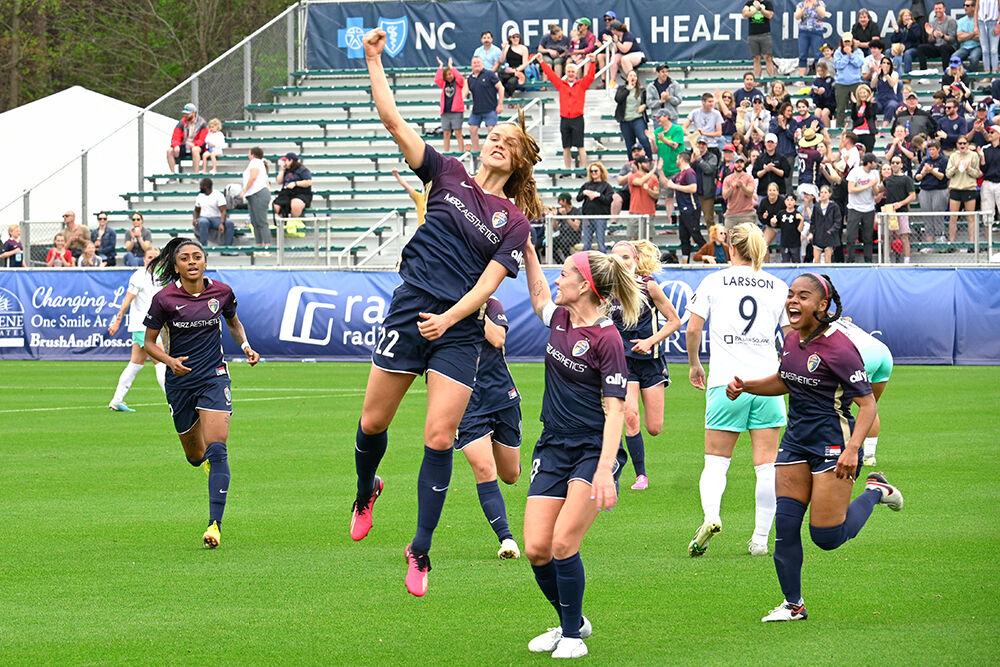 NC Courage forward Mille Gejl celebrates with her teammates after making a shot on goal during the game against the Kansas City Current at WakeMed Soccer Park on Saturday, March 25, 2023. Gejl scored one goal against the Kansas City Current. NC Courage won the game 1-0.