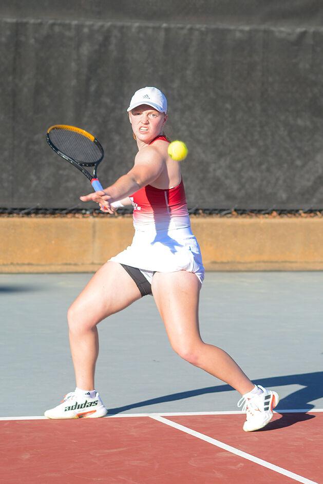 Junior Sophie Abrams forehands the ball during her singles match against East Tennessee State University at the Dail Outdoor Tennis Stadium on Sunday, March 5, 2023. Abrams won her singles match 2-0. NC State beat ETSU 7-0.