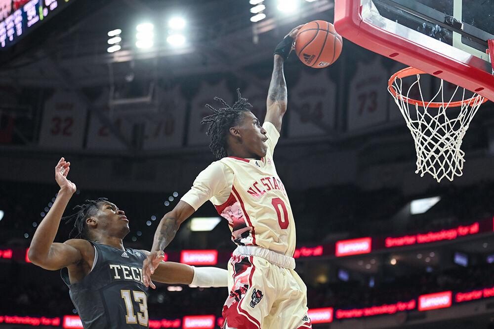 Sophomore guard Terquavion Smith dunks the ball during the game against Georgia Tech in PNC Arena on Saturday, Feb. 4, 2023. Smith had 10 assists and 3 rebounds. The Wolfpack beat the Yellow Jackets 72-64.