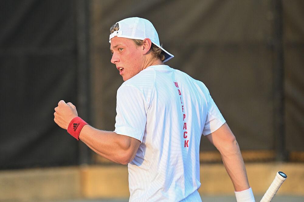 Sophomore Fons Van Sambeek celebrates winning a point against Notre Dame at Dail Outdoor Tennis Stadium on Friday, March 24, 2023. NC State beat Notre Dame 4-0.