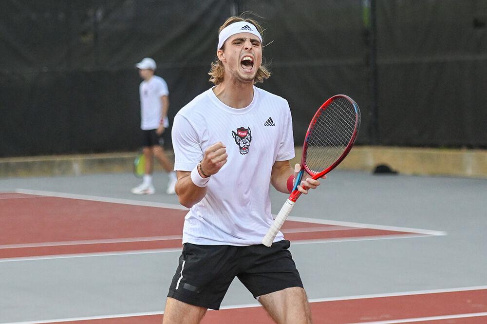 Senior Robin Catry celebrates winning his set against Notre Dame at Dail Outdoor Tennis Stadium on Friday, March 24, 2023. Catry won his singles match. NC State beat Notre Dame 4-0.