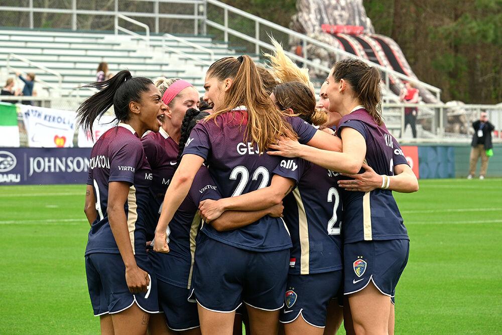 Members of the NC Courage celebrate after their first goal during their game against the Kansas City Current at WakeMed Soccer Park on Saturday, March 25, 2023. NC Courage beat the Kansas City Current&#160;1-0.