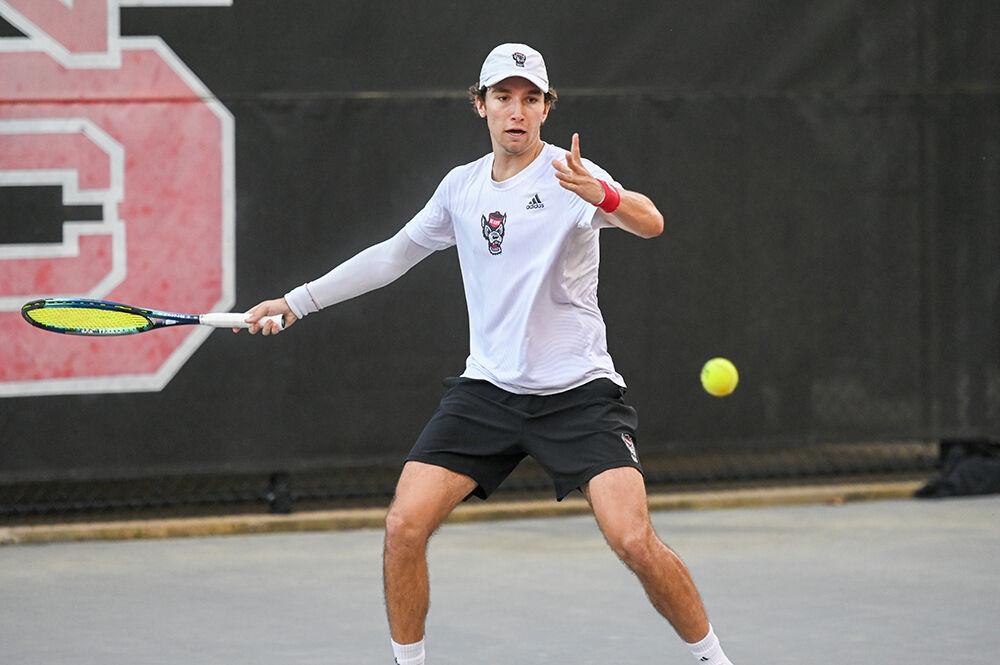 Sophomore Joseph Wayand returns the ball during the match against Notre Dame at Dail Outdoor Tennis Stadium on Friday, March 24, 2023. NC State beat Notre Dame 4-0.