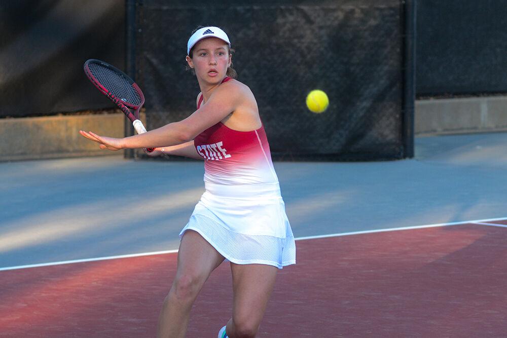 Junior Gina Dittmann forehands the ball during her singles match against East Tennessee State University at the Dail Outdoor Tennis Stadium on Sunday, March 5, 2023. Dittmann won her singles match 2-0. NC State beat ETSU 7-0.