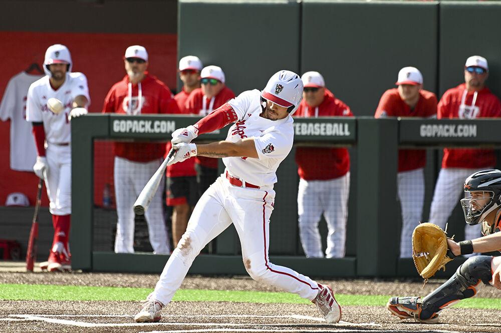 Junior infielder Kalae Harrison hits the ball during the game against the University of Virginia at Doak Field at Dail Park on Saturday, March 18, 2023. Harrison made two runs. The Wolfpack beat the Cavaliers 5-4.