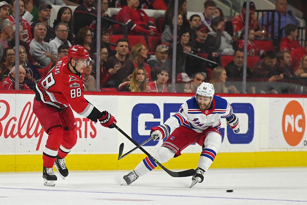 Carolina Hurricanes center Martin Necas passes the puck during the game against the New York Rangers in PNC Arena on Thursday, March 23, 2023. The Hurricanes lost 2-1.