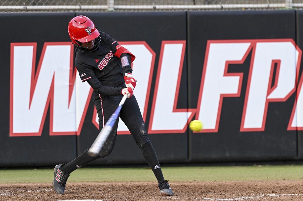 Freshman utility player Makayla Marbury hits the ball during the final game against Notre Dame in Dail Softball Stadium on Saturday, March 11, 2023. NC State lost to Notre Dame 7-1&#160;in the second game of the doubleheader.