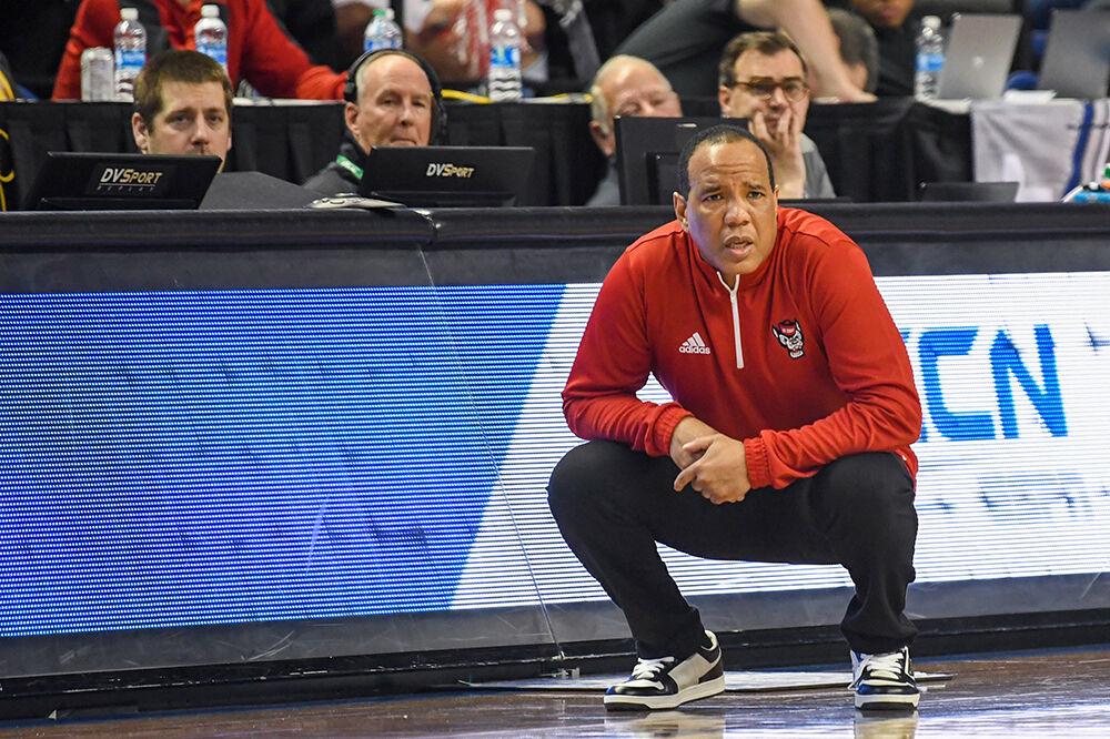Head coach Kevin Keatts eyes the action during the second round of the ACC Tournament game against Virginia Tech in Greensboro Coliseum on Wednesday, March 8, 2023. NC State beat Virginia Tech 97-77.