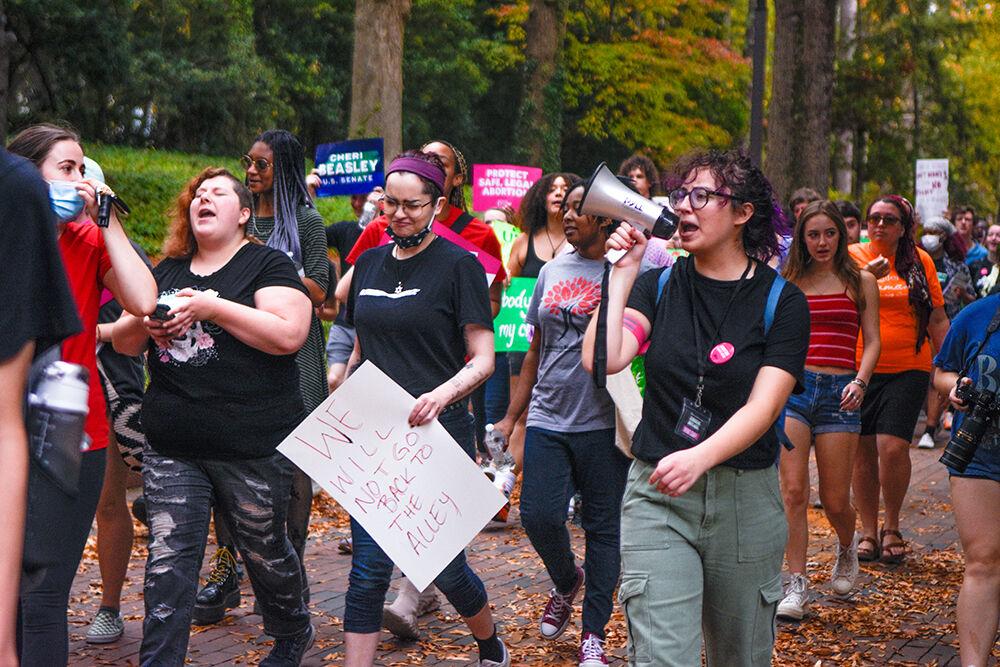 NC State students chant as they walk during the Reproductive Rights March at Stafford Commons on Nov. 6, 2022. The march was held by the Progressive Students Task Force and&#160;Planned Parenthood Generation Action.