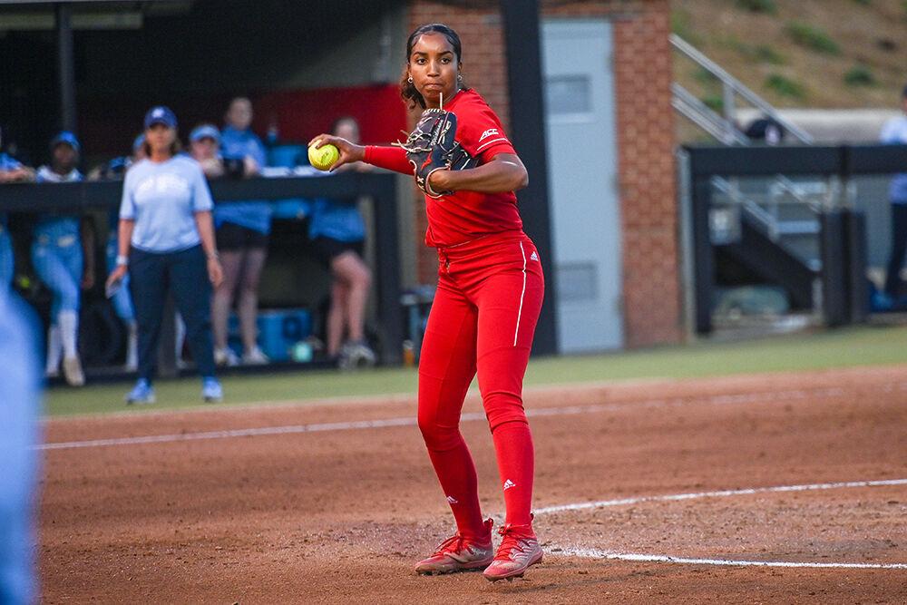 Redshirt junior pitcher Aisha Weixlmann throws the ball to first base during the game against UNC-Chapel Hill at Dail Softball Stadium on Friday, April 21, 2023. NC State lost to the Tar Heels 5-4.