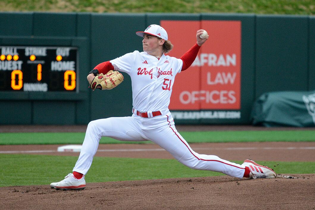 Freshman pitcher Dominic Fritton pitches during the game against Wagner on Doak Field at Dail Park on Sunday, Feb. 19, 2023. The Wolfpack beat the Seahawks 9-0.