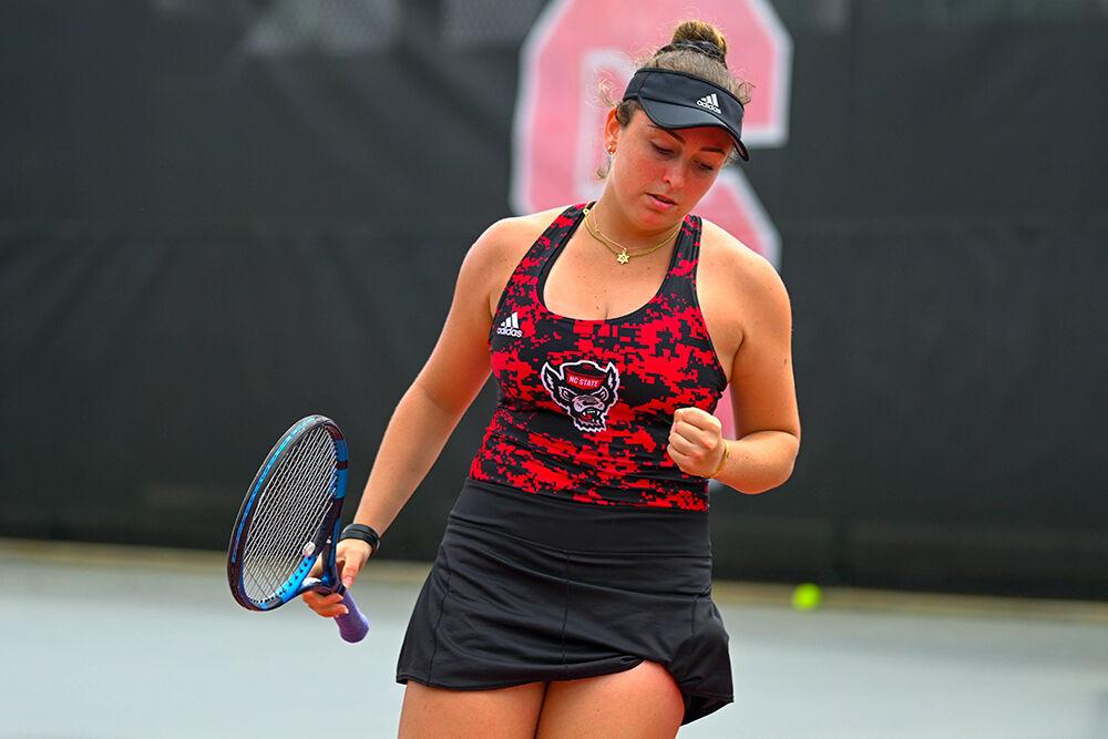 Junior Abigail Rencheli celebrates after gaining a point during the match against Virginia Tech at&#160;Dail Outdoor Tennis Stadium on Sunday, April 16, 2023. Rencheli won her doubles and singles matches. NC State beat Virginia Tech 7-0.