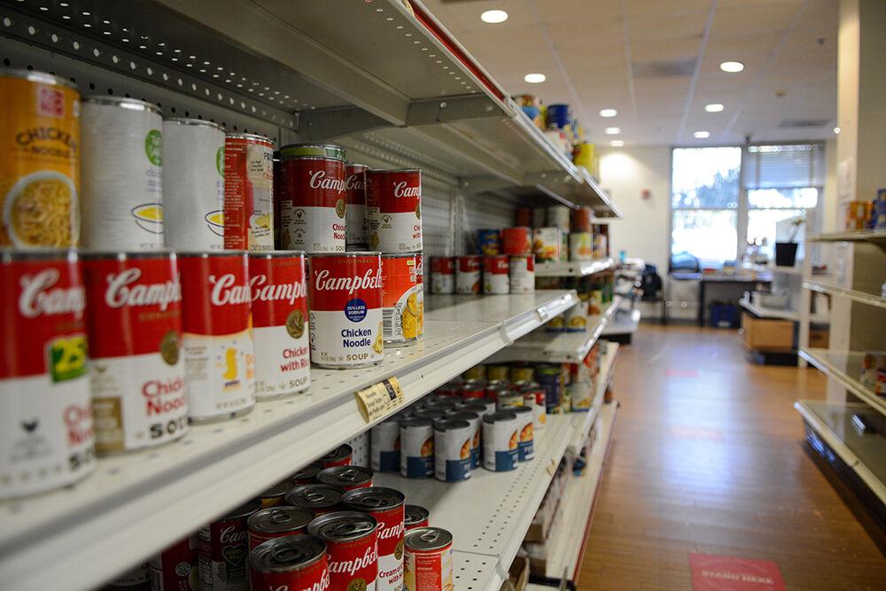 Canned goods stacked in Feed the Pack food pantry&#160;on Wednesday, Feb. 9, 2022 in Quad Commons. Feed the Pack offers many goods to NC State students, faculty and staff.
