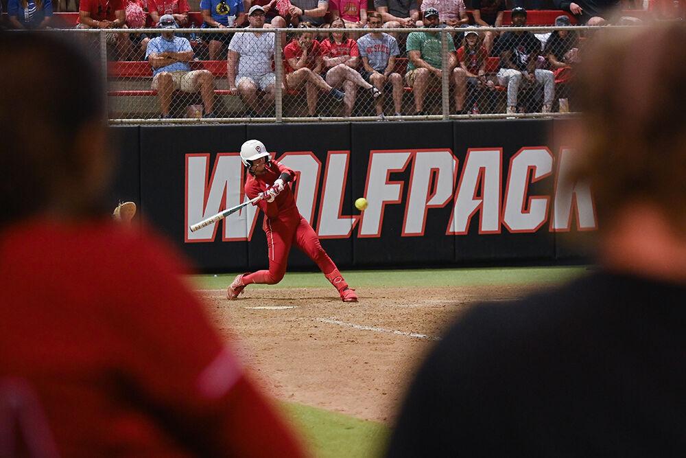 Graduate outfielder Katlyn Pavlick hits the ball during the game against UNC-Chapel Hill at Dail Softball Stadium on Friday, April 21, 2023. Pavlick had one hit and scored one run. NC State lost to the Tar Heels 5-4.