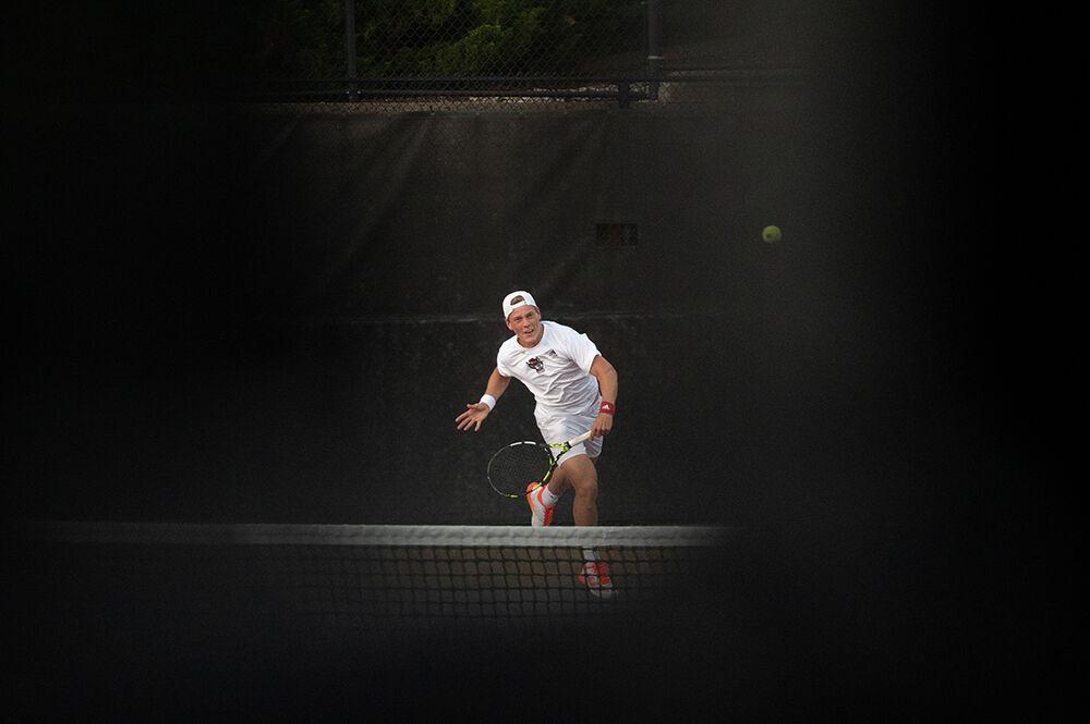 Sophomore Fons Van Sambeek forehands the ball during the match against Wake Forest at Dail Outdoor Tennis Stadium on Wednesday, April 12, 2023. NC State beat Wake Forest 4-2.