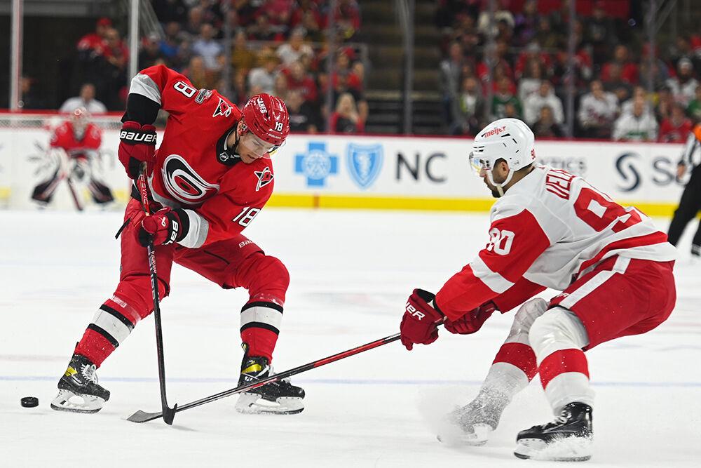 Carolina Hurricanes center Jack Drury goes after the puck during the game against the Detroit Red Wings in PNC Arena on Tuesday, April 11, 2023. Drury had one assist throughout the game. The Hurricanes won 4-1.