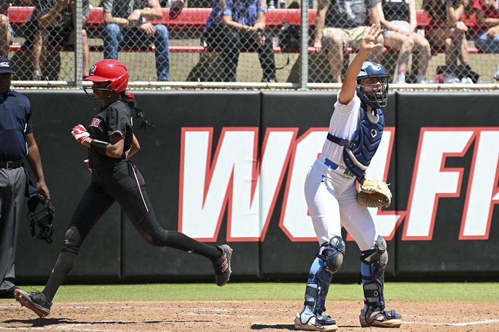 Freshman utility player Makayla Marbury runs to home plate during the game against UNC-Chapel Hill at Dail Softball Stadium on Saturday, April 23, 2023. Marbury scored one run. The Wolfpack lost to the Tar Heels 4-2.