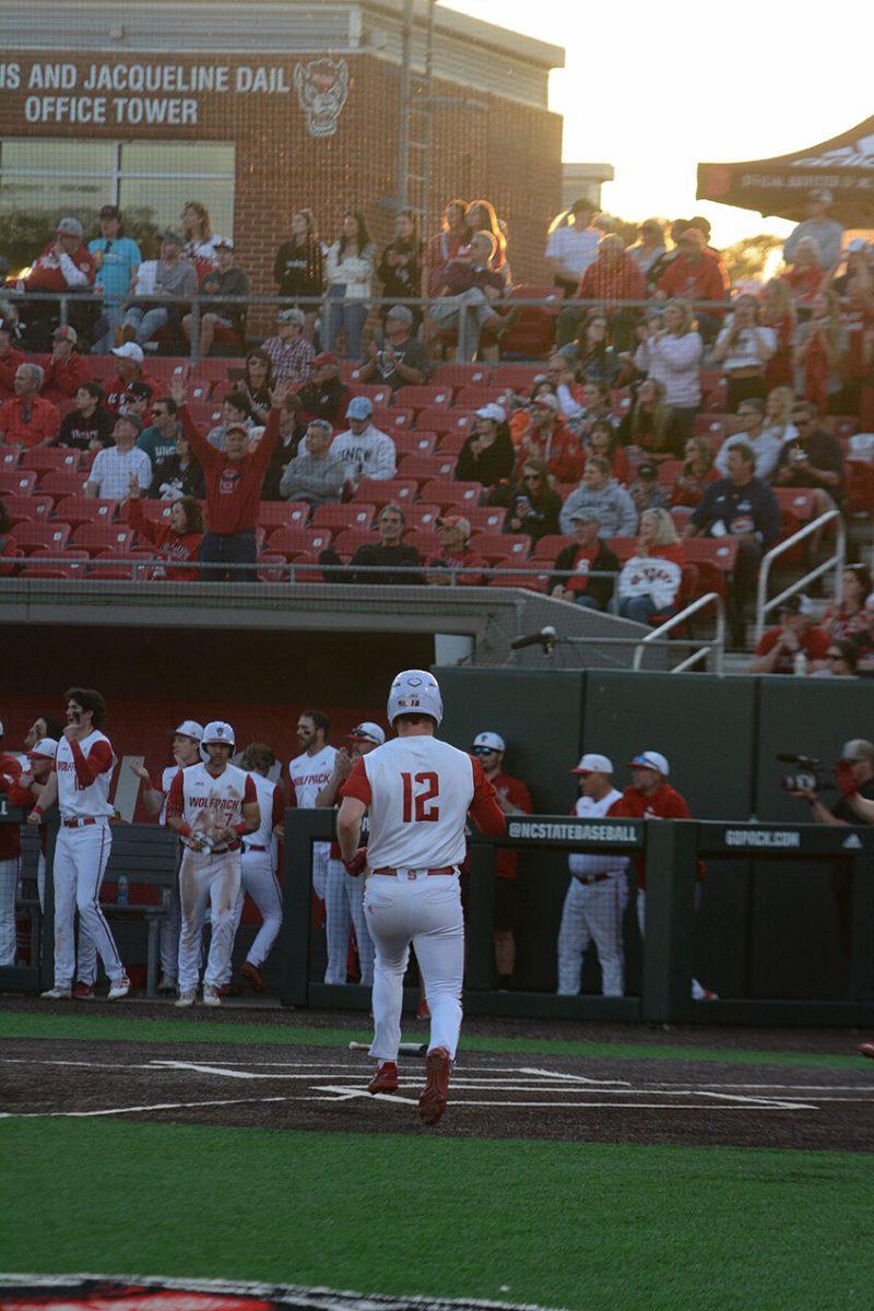 Sophomore outfielder Chase Nixon runs home during the Wolfpack's home game against the UNC-Wilmington Seahawks at Doak Field at Dail Park on Tuesday April 11, 2023. Nixon had one hit, one run and three RBI's. NC State won 12-3.