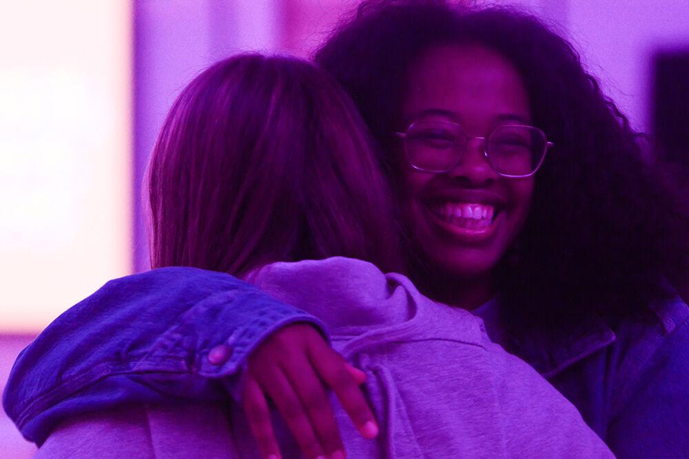 Julia Randriatsimivony, a third-year studying business administration, hugs Elene Maglakelidze, a fourth-year studying business administration, while at the BSB Roll Bounce Skating event for Pan-African week in Talley Student Union on Monday, April 3, 2023. Pan-African week is celebrated in the month of April to highlight Pan-Africanism.