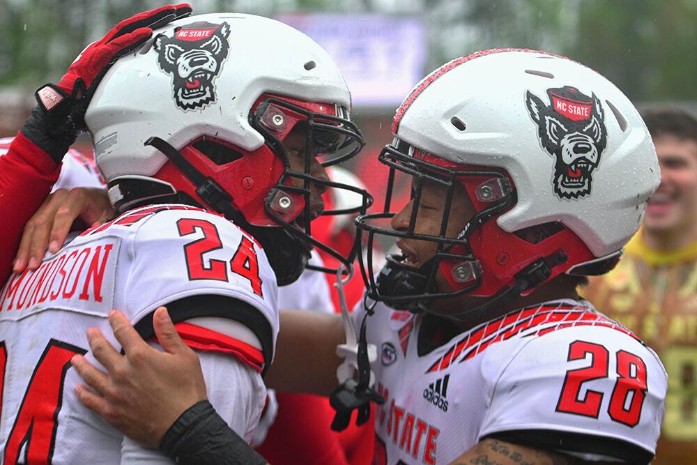 Redshirt senior cornerback Darius Edmundson and freshman safety Zack Myers celebrate after a touchdown during the spring game at Carter-Finley Stadium on Saturday,&#160;April 8, 2023. The Red team beat the White team 41-10.