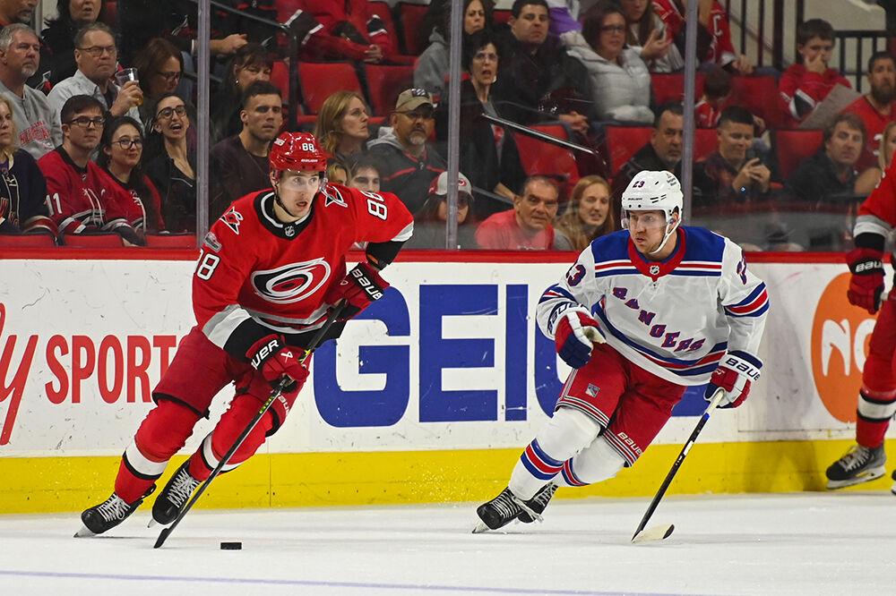 Carolina Hurricanes center Martin Necas dribbles the puck during the game against the New York Rangers in PNC Arena on Thursday, March 23, 2023. The Hurricanes lost 2-1.